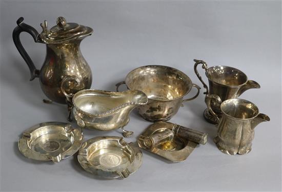 Mixed silver items including sauceboat, hot water pot, two handled bowl and ashtrays.